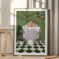 Framed whimsical frog bathroom wall art displayed beside a sink
