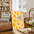 Wildflower canvas with uplifting lettering displayed in a bright room