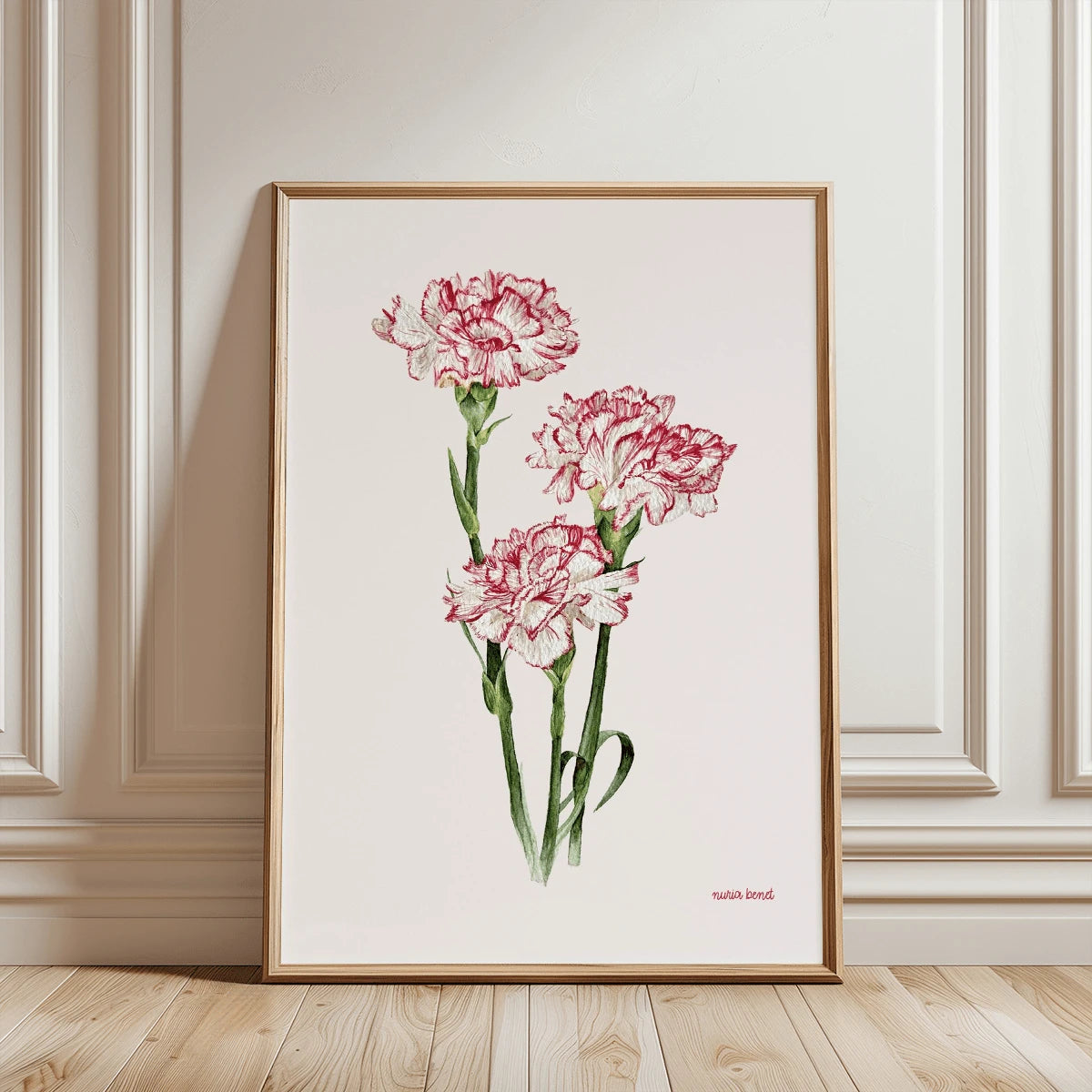 Framed red and white carnation artwork styled in a warm neutral interior