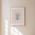 Minimalist lavender canvas with blue bow and soft pink background