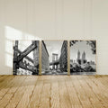 Broadway bridge and skyline poster trio leaning on light wood floor