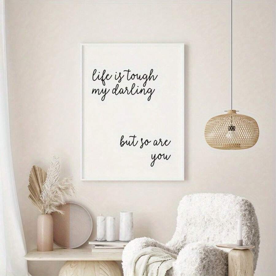 Black and white encouragement wall art in a neutral reading nook