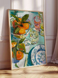 Mediterranean orange still life wall art shown in bright kitchen style