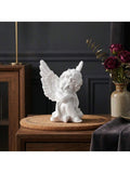 Glossy white cherub figurine with detailed curls, face, toes, and feathers.