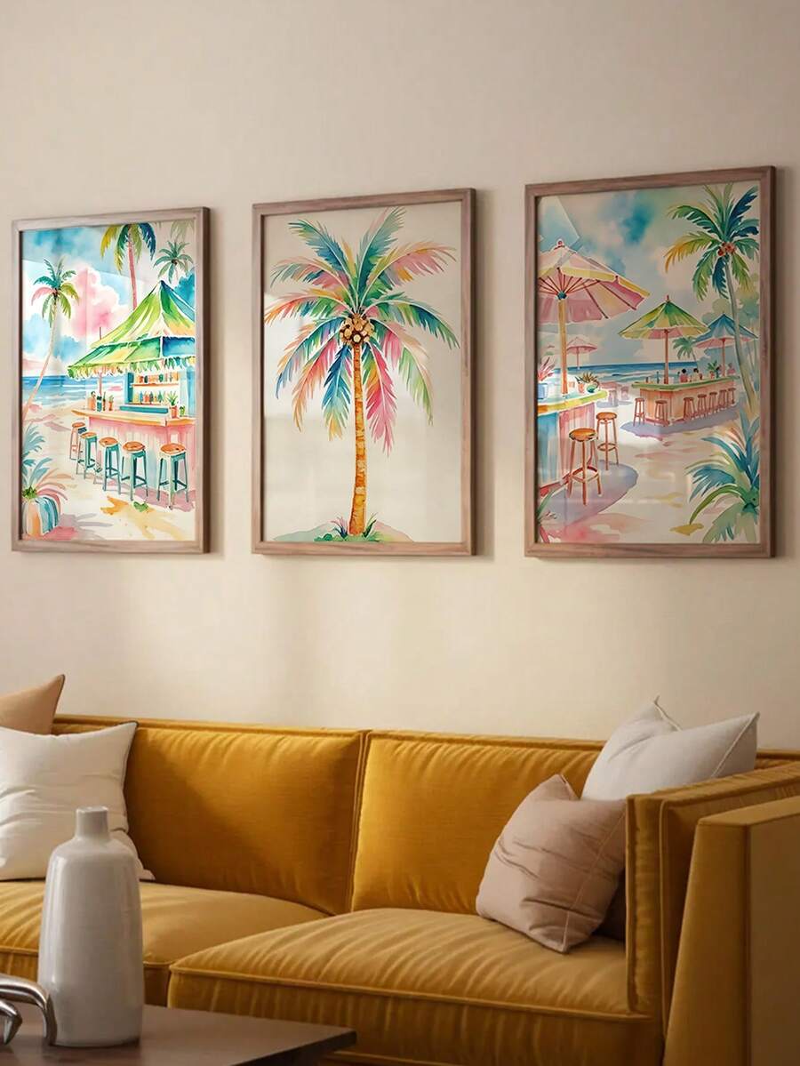 Pastel beach watercolor prints above a sofa