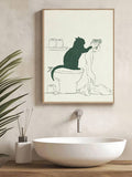 Cat bathroom decor showing cat on toilet pulling paper above sink in framed poster