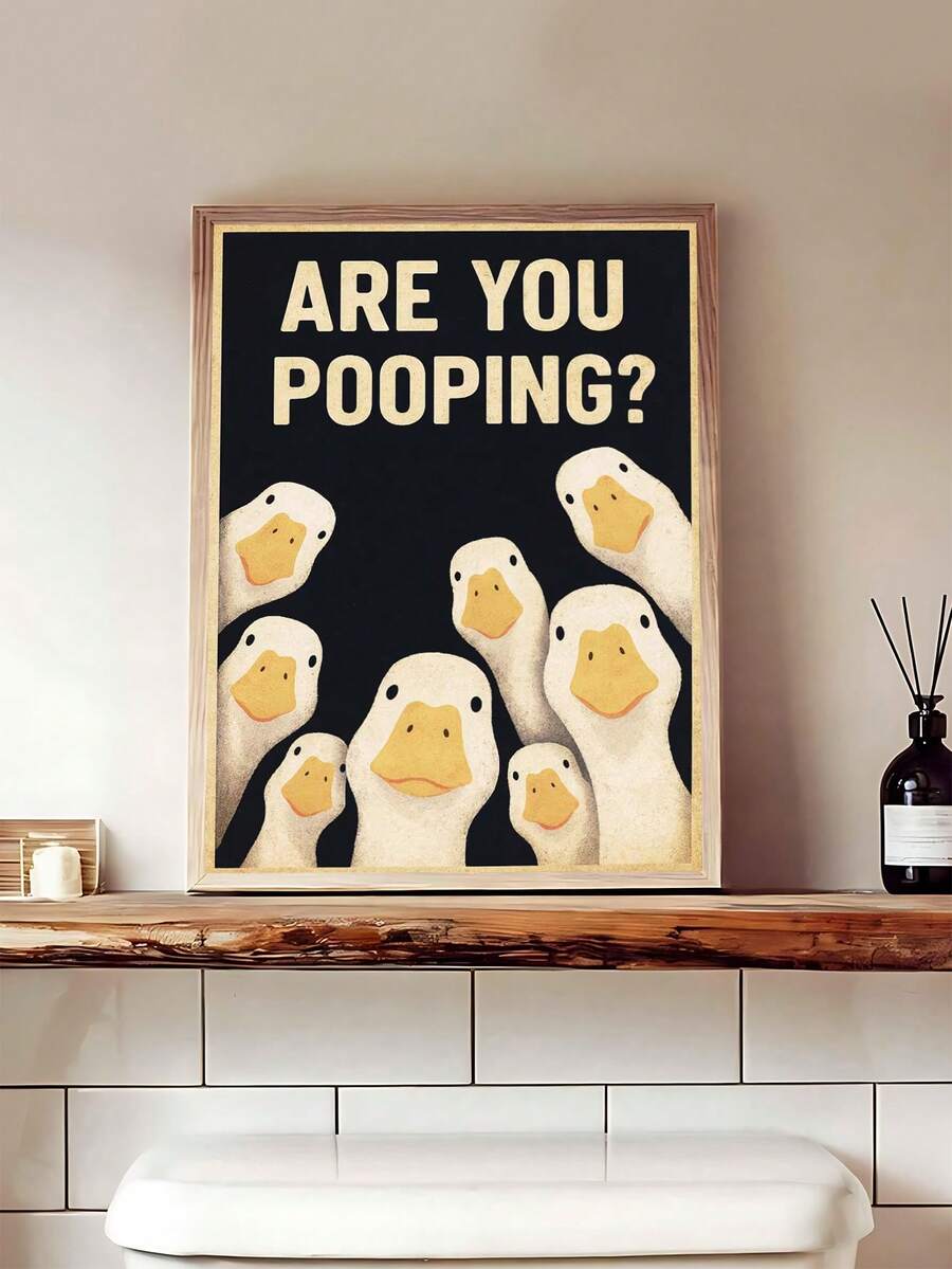 Funny animal print with duck Are you pooping quote above toilet and beige bathroom decor