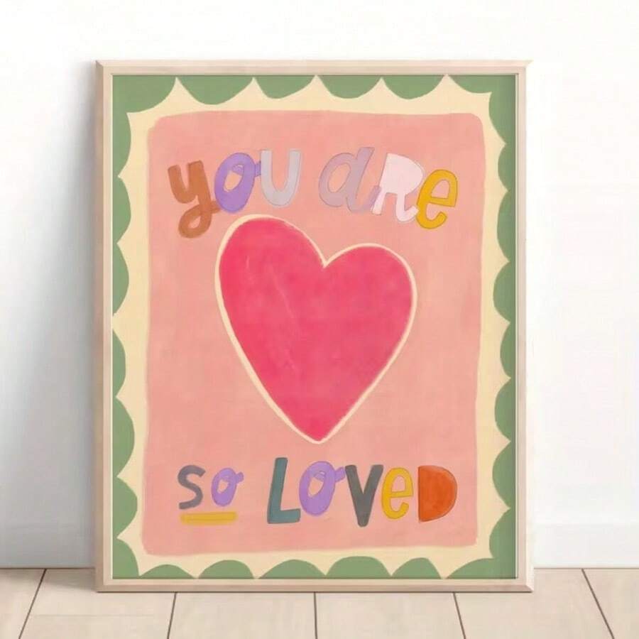 Pink watercolor nursery poster with large heart and text you are so loved