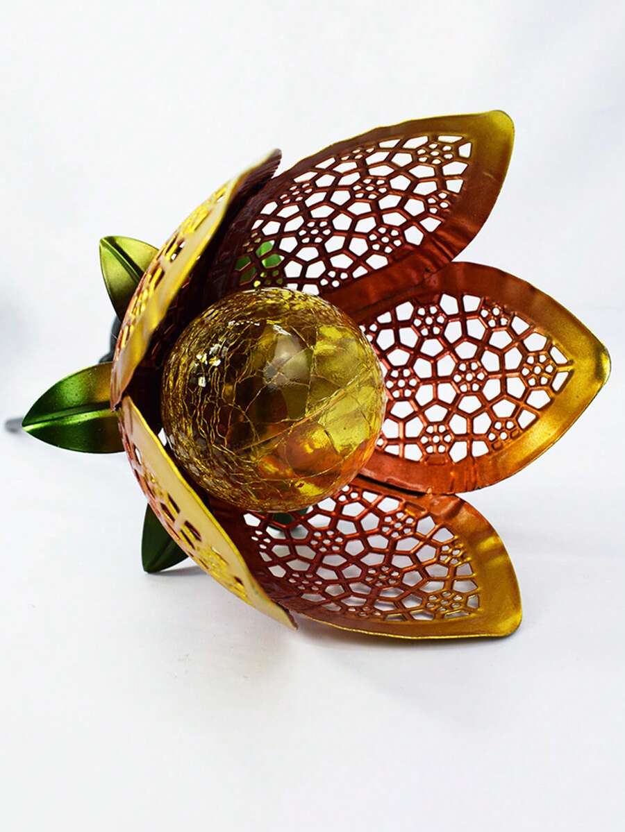 Solar flower ground stake product close-up on white background with crackle globe center