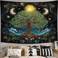 Bohemian tree wall hanging displayed above sofa with black backdrop and ornate border