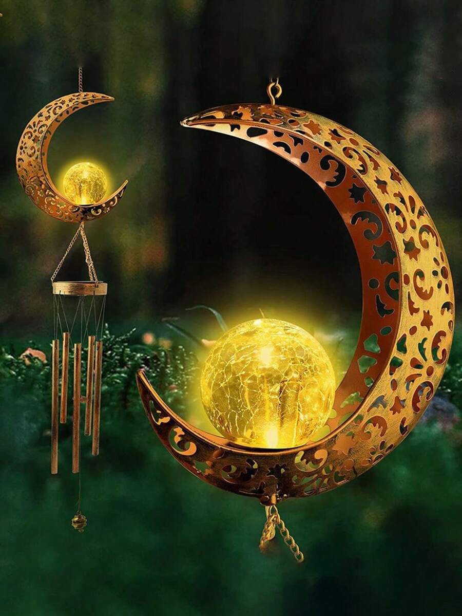 Solar wind chime decor shown lit at night with auto on and off feature.