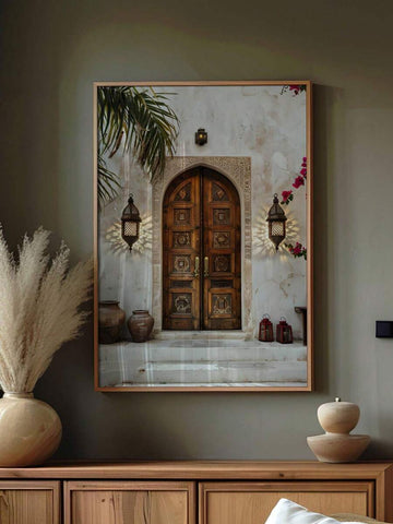 Moroccan wall art print with ornate carved door arch lanterns and warm brown tones