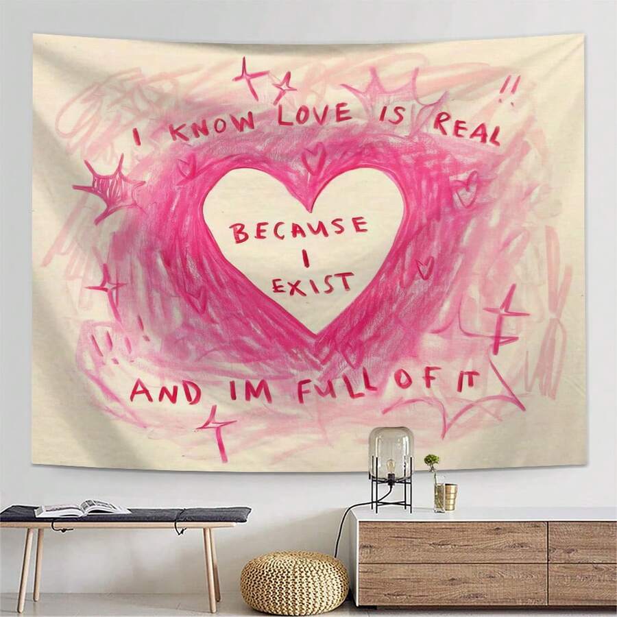 Pink heart letter tapestry with love quote on cream background in room mockup