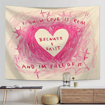 Pink heart letter tapestry with love quote on cream background in room mockup