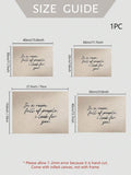Black Do It typography poster leaning against a brown leather chair