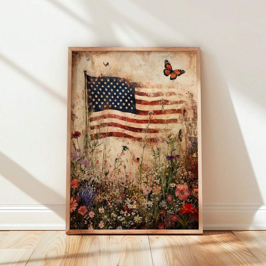 Framed vintage American flag canvas print with wildflowers and monarch butterfly on white paneled wall