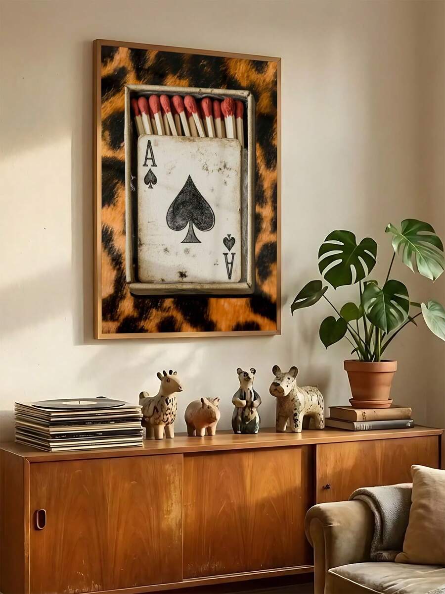 Ace card poster wall mounted above cabinet with plants records and maximalist decor