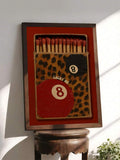8 ball wall art close view on small table with leopard print matchbox design