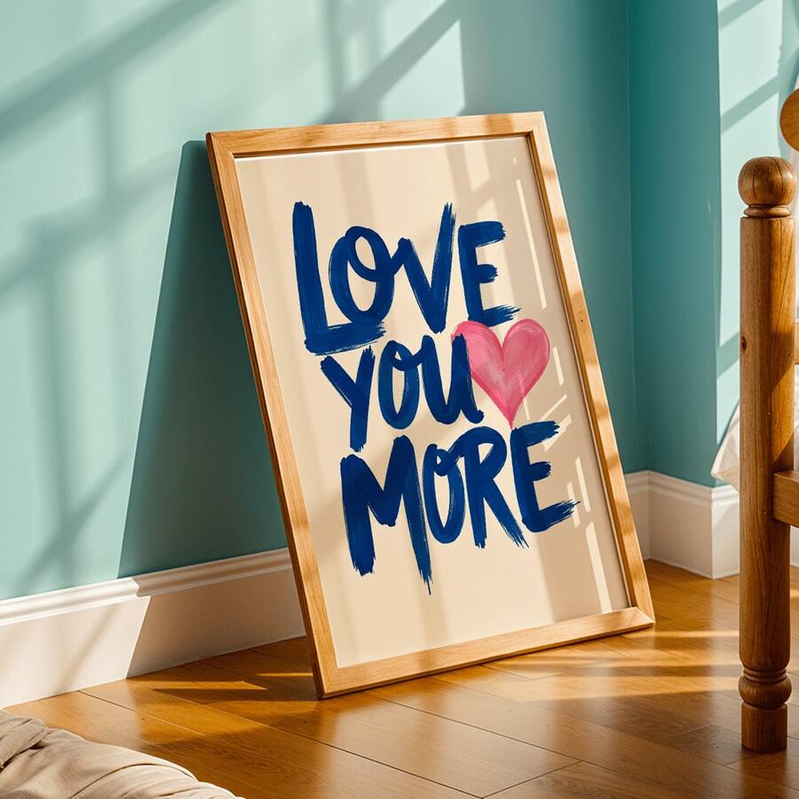 Blue quote and pink heart wall art styled against teal bedroom wall