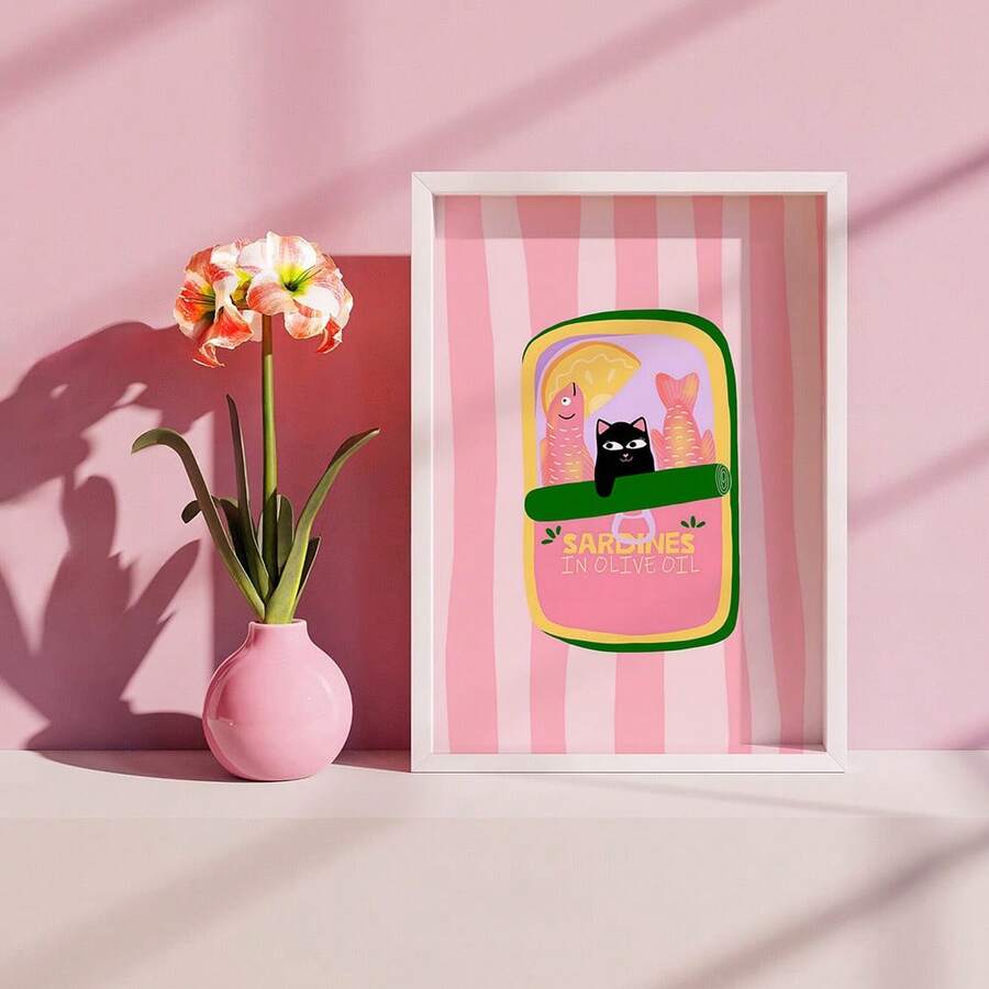 White framed black cat sardines poster on pink wall
