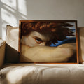Classical portrait canvas poster in brown cream and blue above a living room sofa