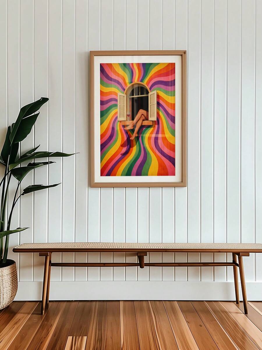 Framed retro rainbow window poster on white paneled wall above woven bench with plant