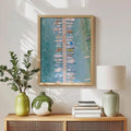 Turquoise water wall art shown in light wood frame