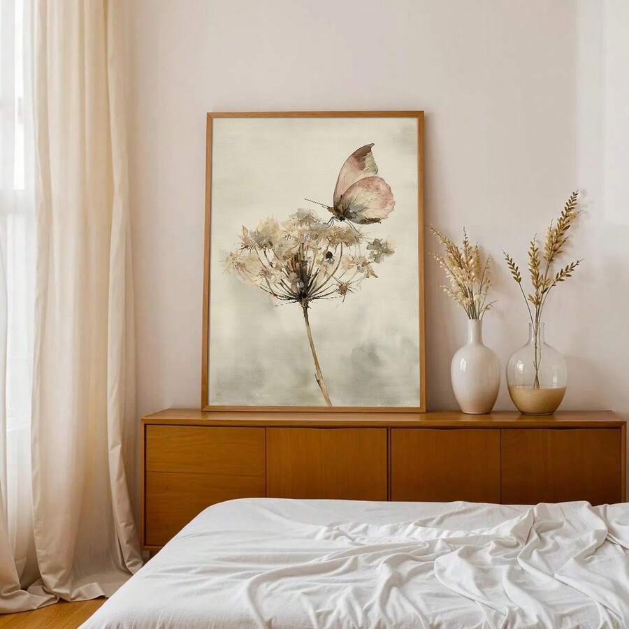 Vintage botanical art showing soft butterfly and floral stem on cream background