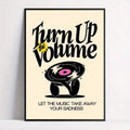 front framed view of Retro music wall art showing Turn Up the Volume typography, a vinyl record character, cream background, black artwork, yellow accent and pink label.