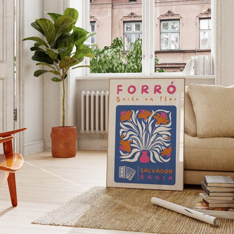 Salvador Bahia flower and accordion print staged beside a plant and sofa