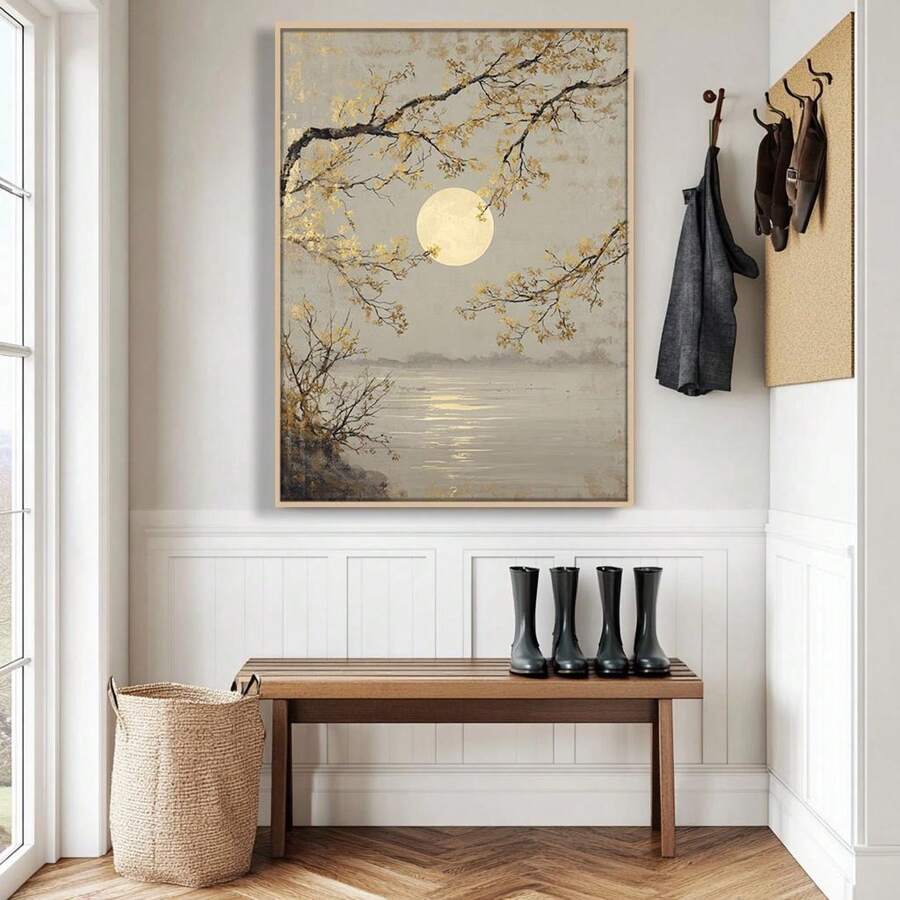 Framed full moon lake landscape wall art with gold tree branches above bathtub in modern bathroom