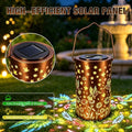 Copper metal hummingbird lantern with solar panel lid and hanging handle.
