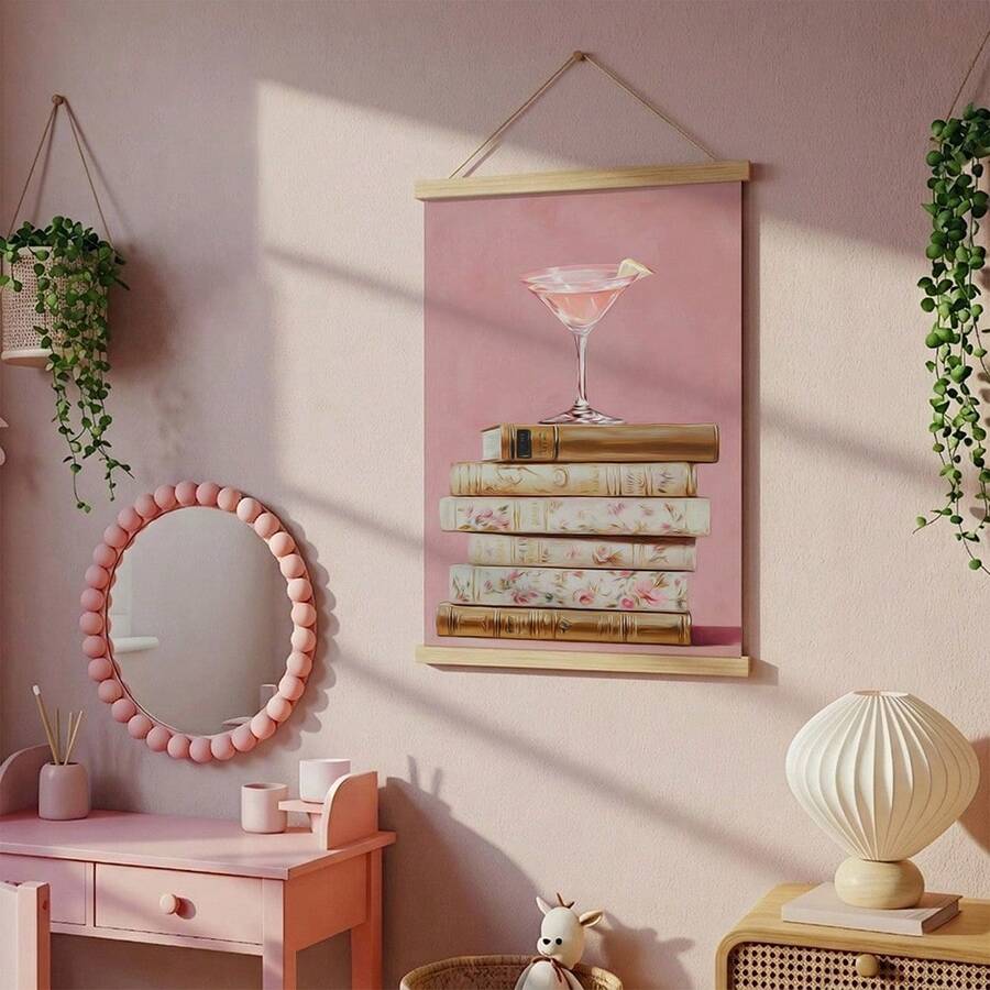 Gold framed martini wall art with vintage books leaning against paneled wall