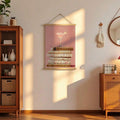 Martini and books poster displayed between wood cabinets in cozy living room