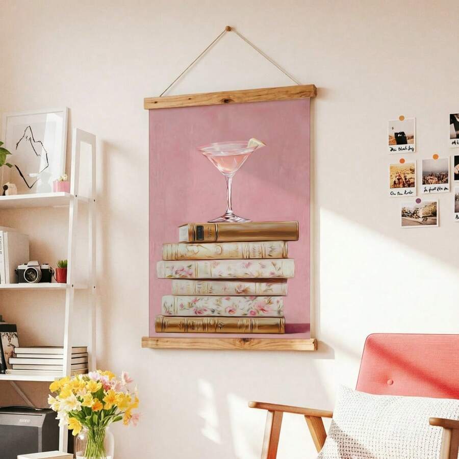 Pink cocktail and floral book stack art in slim gold frame