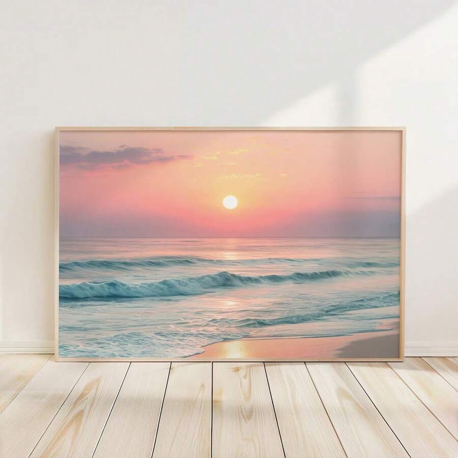 canvas option view of Framed coastal wall art print showing ocean waves, beach shoreline, sunrise or sunset sun, pastel sky and soft modern beach house colors.