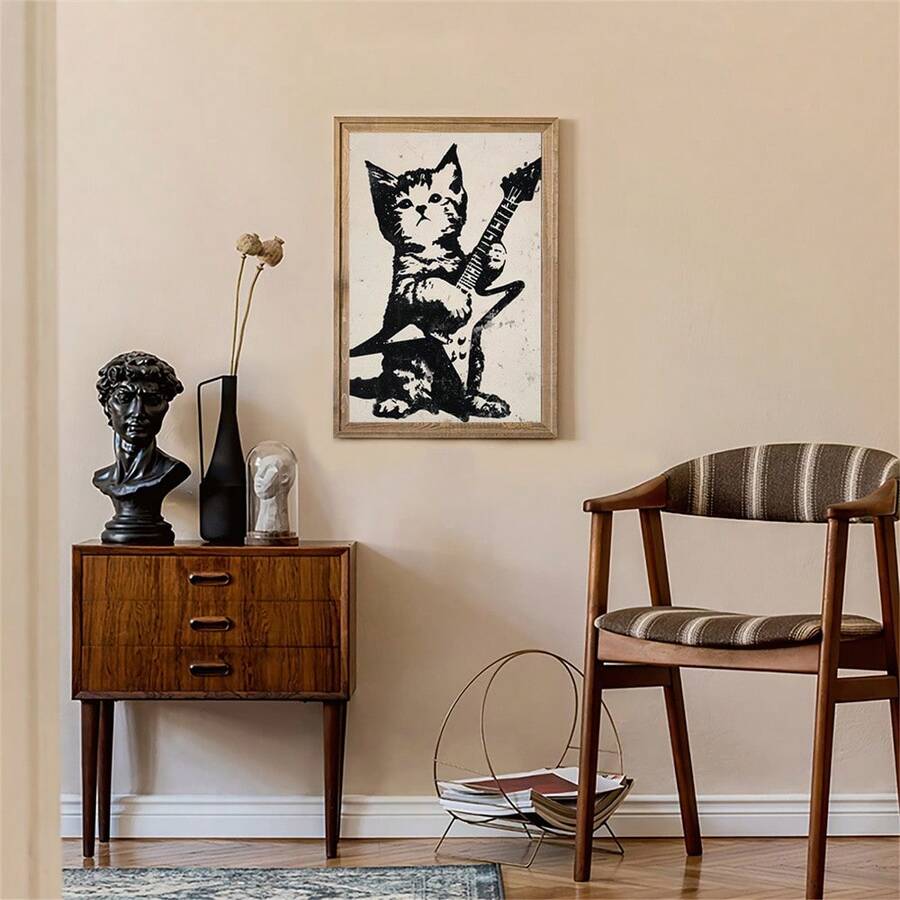 Rock guitar cat wall art above wood cabinet