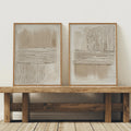 Matching beige abstract canvases displayed together in slim wood frames