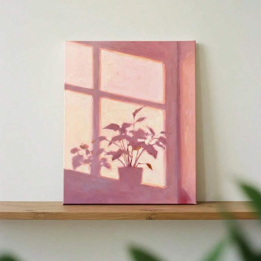 Close view pink plant window wall art leaning on wood shelf
