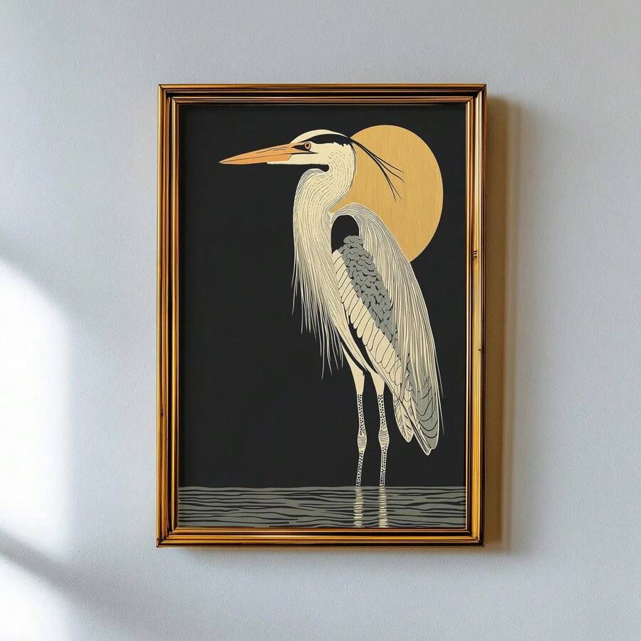 Ornate gold framed heron print hanging on pale wall