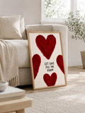 Folk floral heart wall art in red pink cream and green cottagecore style