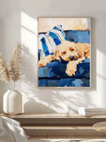 Abstract dog canvas print shown above blue sofa