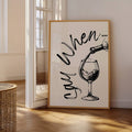 Framed wine print with cream background and light wood frame