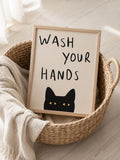 Minimalist black cat reminder on canvas above pale wood furniture and vase