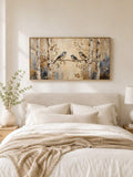 front framed view of Rustic nature canvas wall art showing three birds on a branch, birch trees, woodland foliage, warm beige neutrals and soft painterly cottage style.