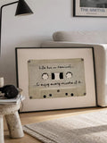 Vintage music poster showing cassette tape and handwritten motivational quote