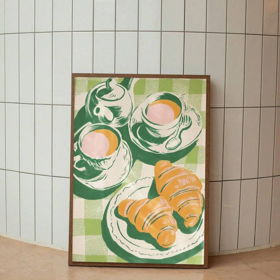 Cafe wall art with playful tea cup poster and light wood frame styling