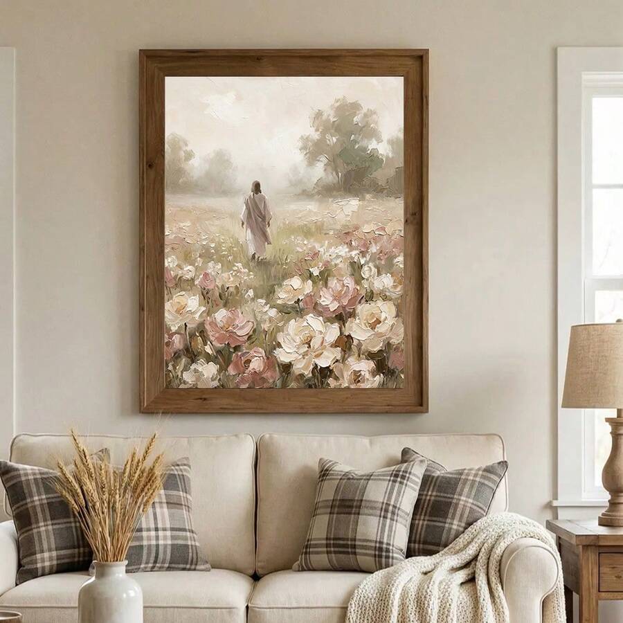 Framed impressionist floral meadow print on wood table with robed figure among roses