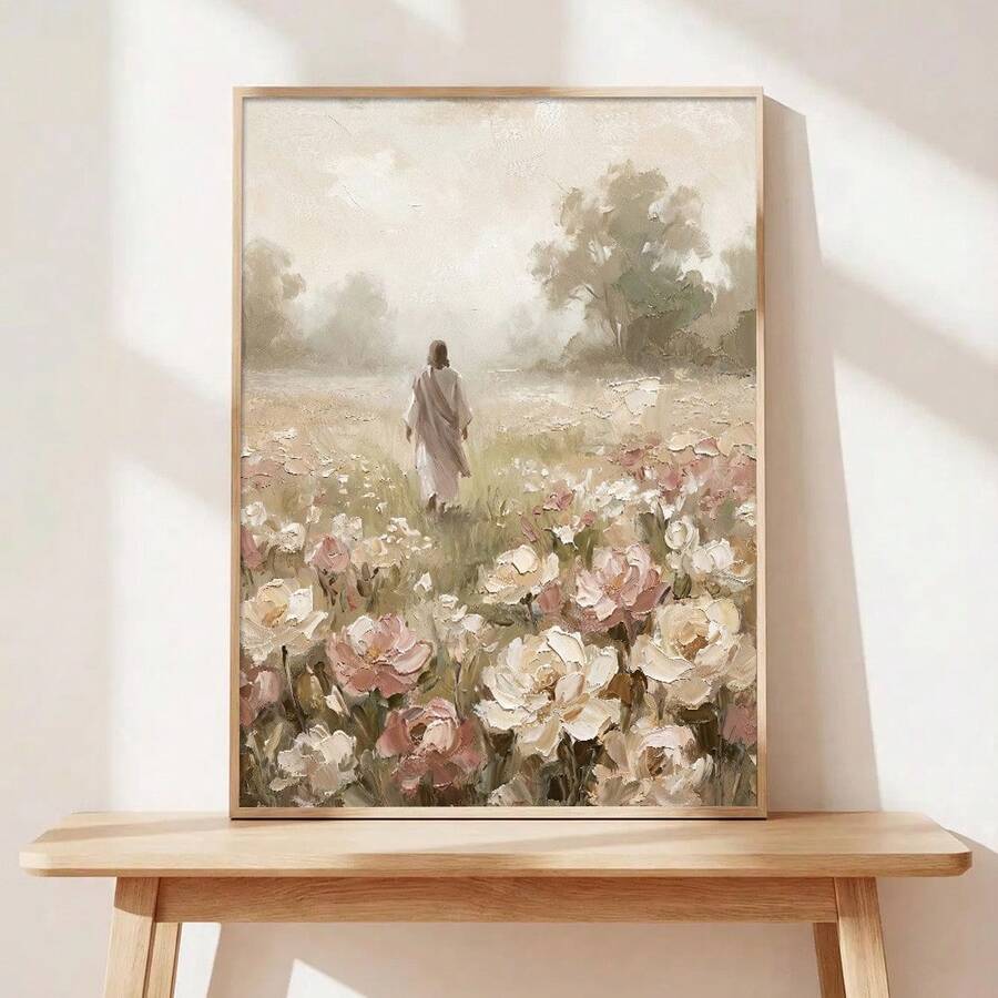 Framed impressionist floral meadow print on wood table with robed figure among roses