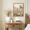 Framed floral meadow print above rustic bedside table with vase and dried flowers